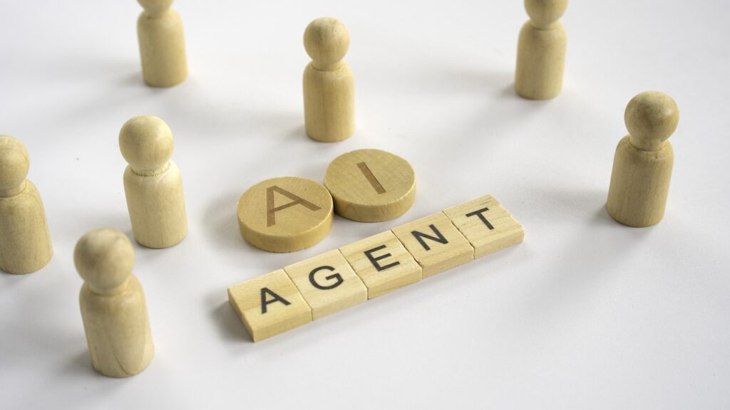 wooden blocks spelling agentic ai vs. ai agents