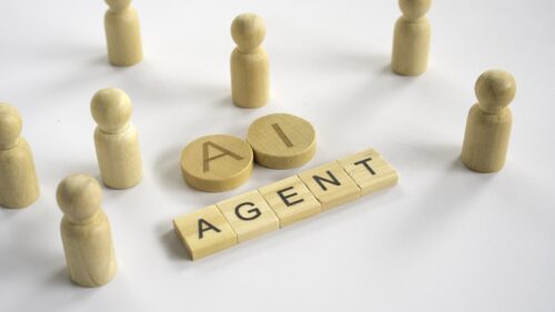 wooden blocks spelling agentic ai vs. ai agents